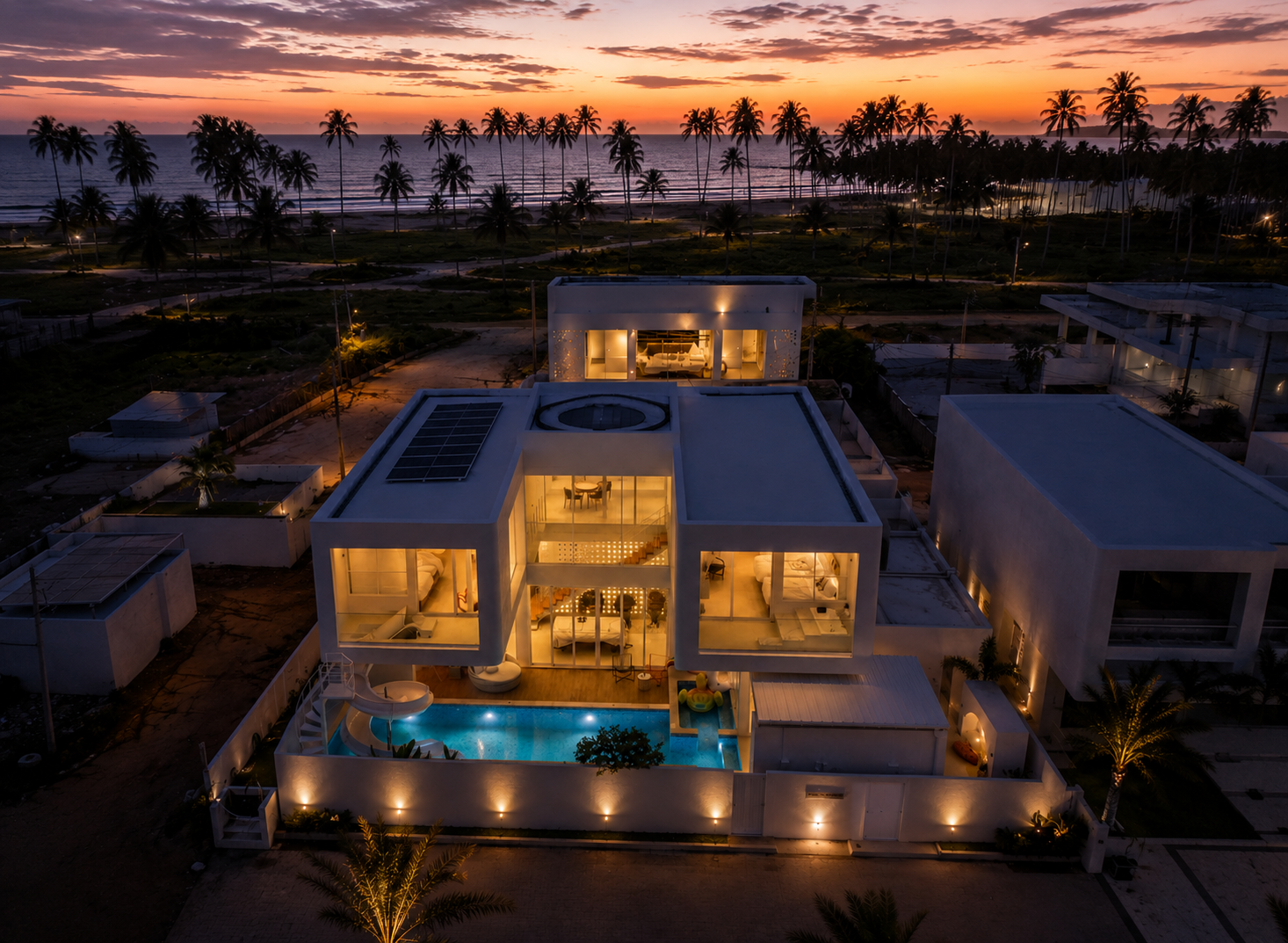 Lush private garden and beachfront villa exterior